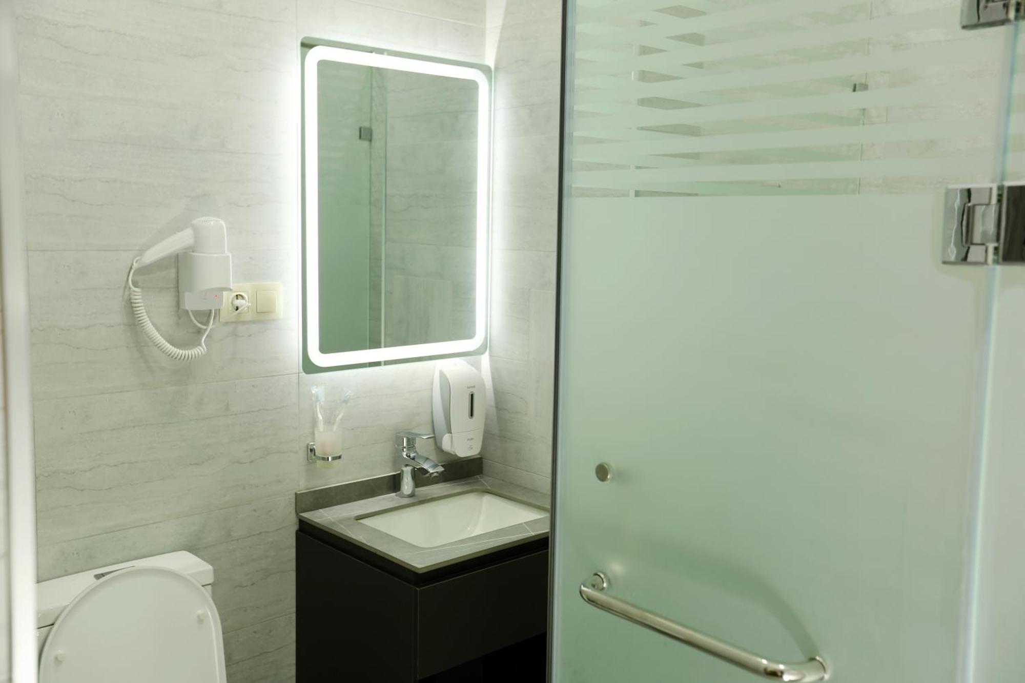 Parklane Hotel Taskent Habitación foto